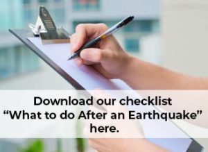 hands writing on clipboard