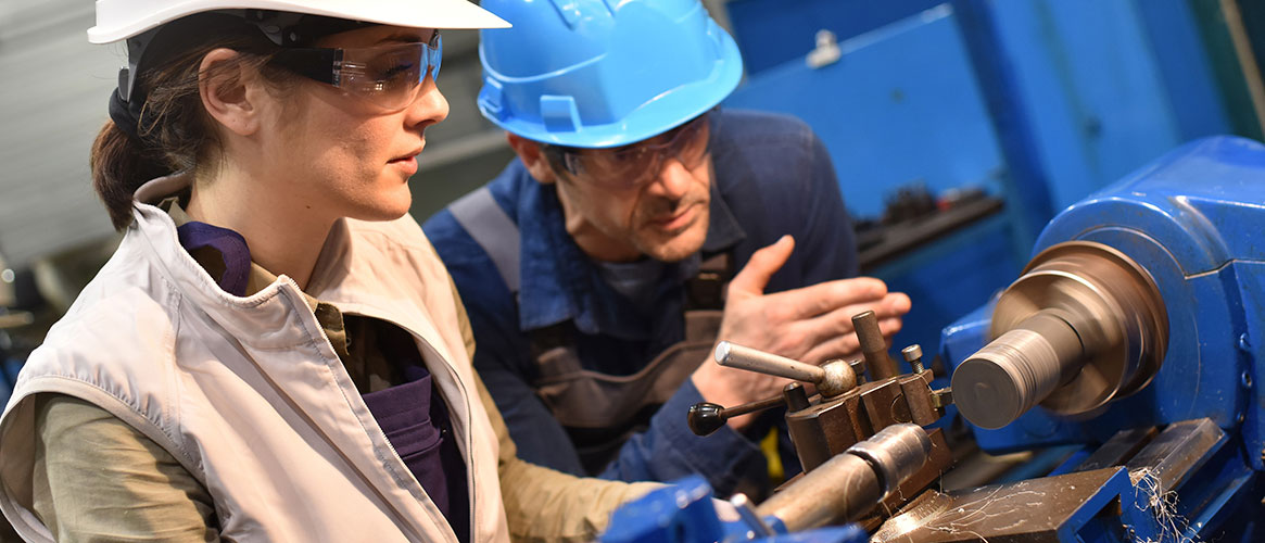 workers using machinery