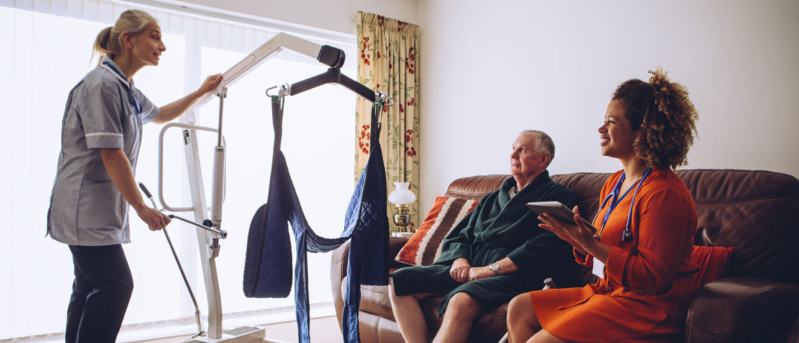 Homecare Workers preparing Hoist