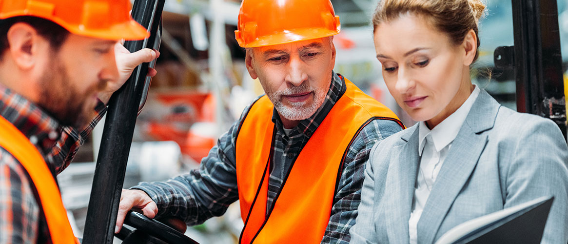 Employees discussing safety culture with a manager
