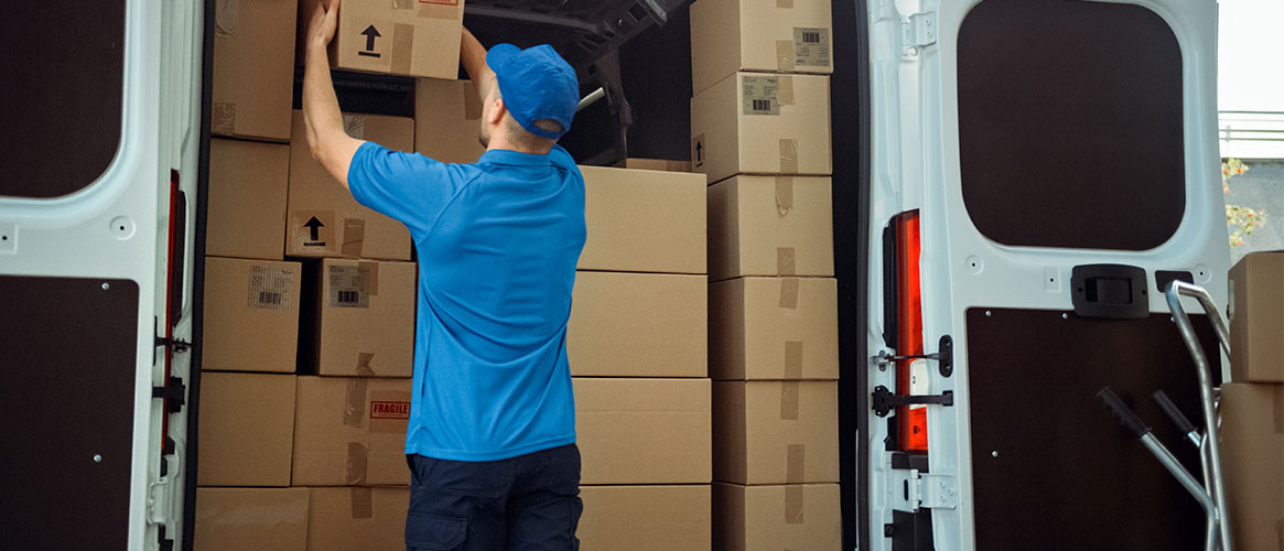 Delivery driver unloading van