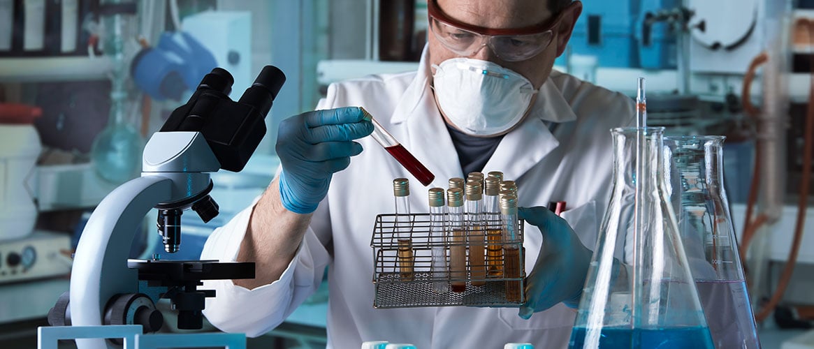 person testing blood in a lab