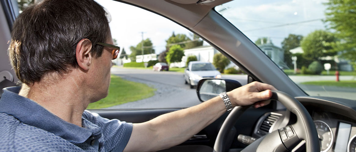 driver looking both ways at intersection
